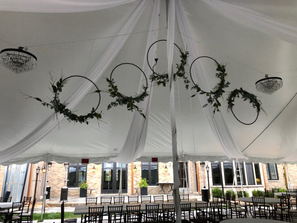 Bride decorated under our 40 x 80 White Tension Tent (we do not own these tables or chairs)
